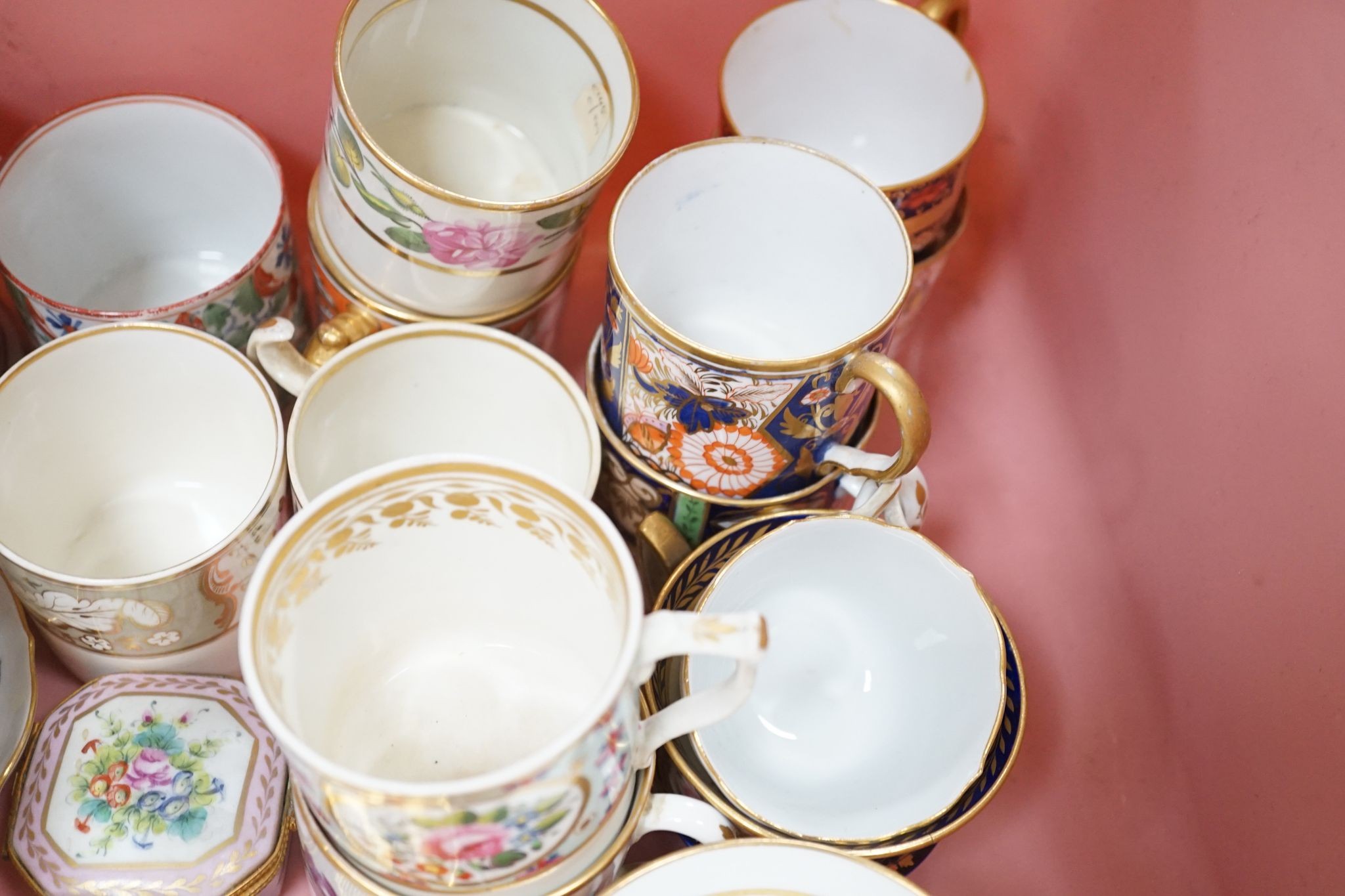 A collection of 19th century English porcelain tea and coffee cups, saucers and other tableware including Royal Crown Derby etc.